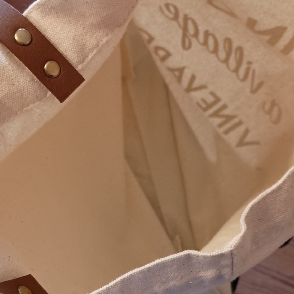 White Canvas Graphic Tote Bag About Parenting with Slightly Worn Brown Straps - Picture 4 of 4